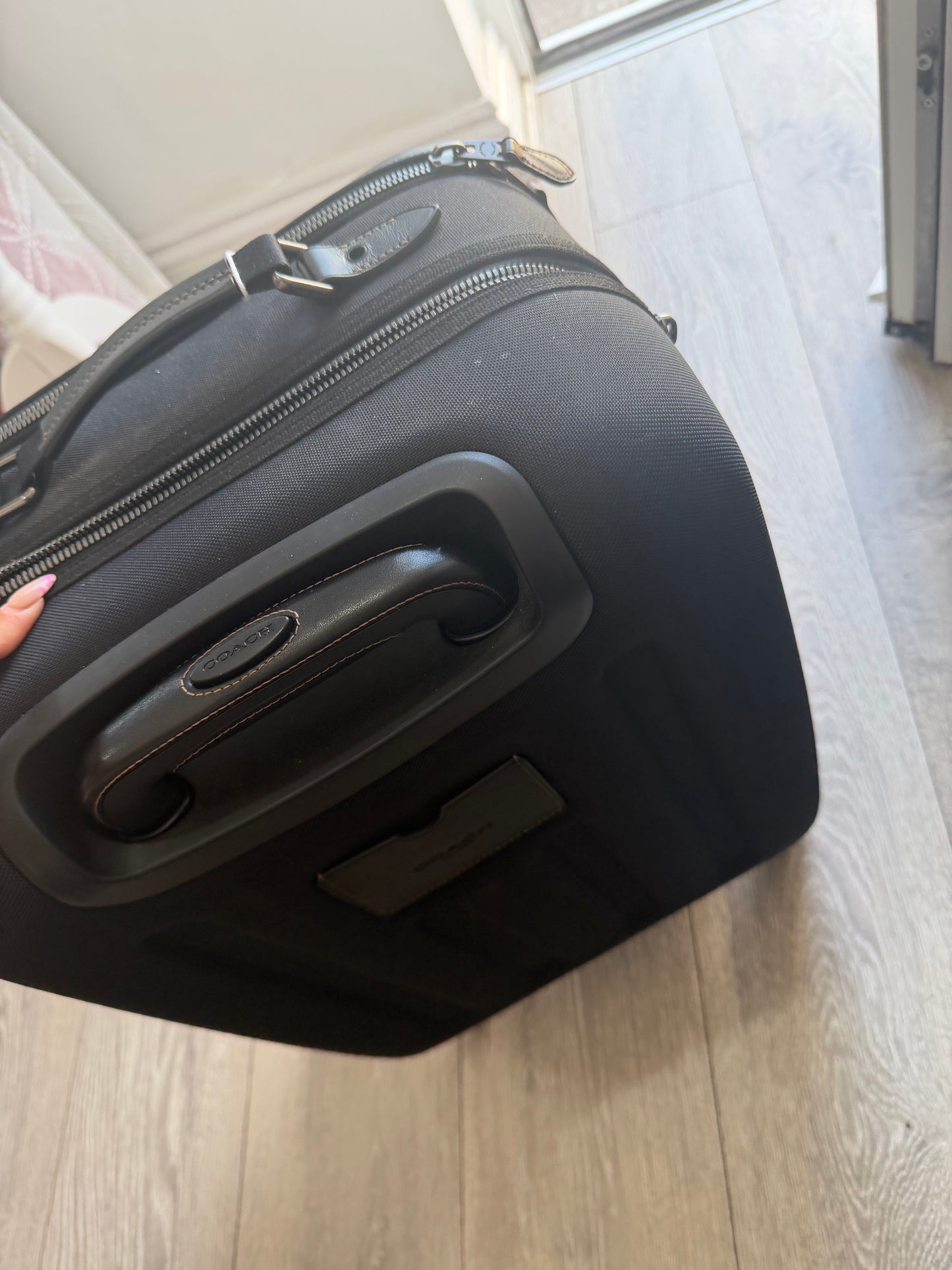 Preloved black and tan Coach Luggage, Medium