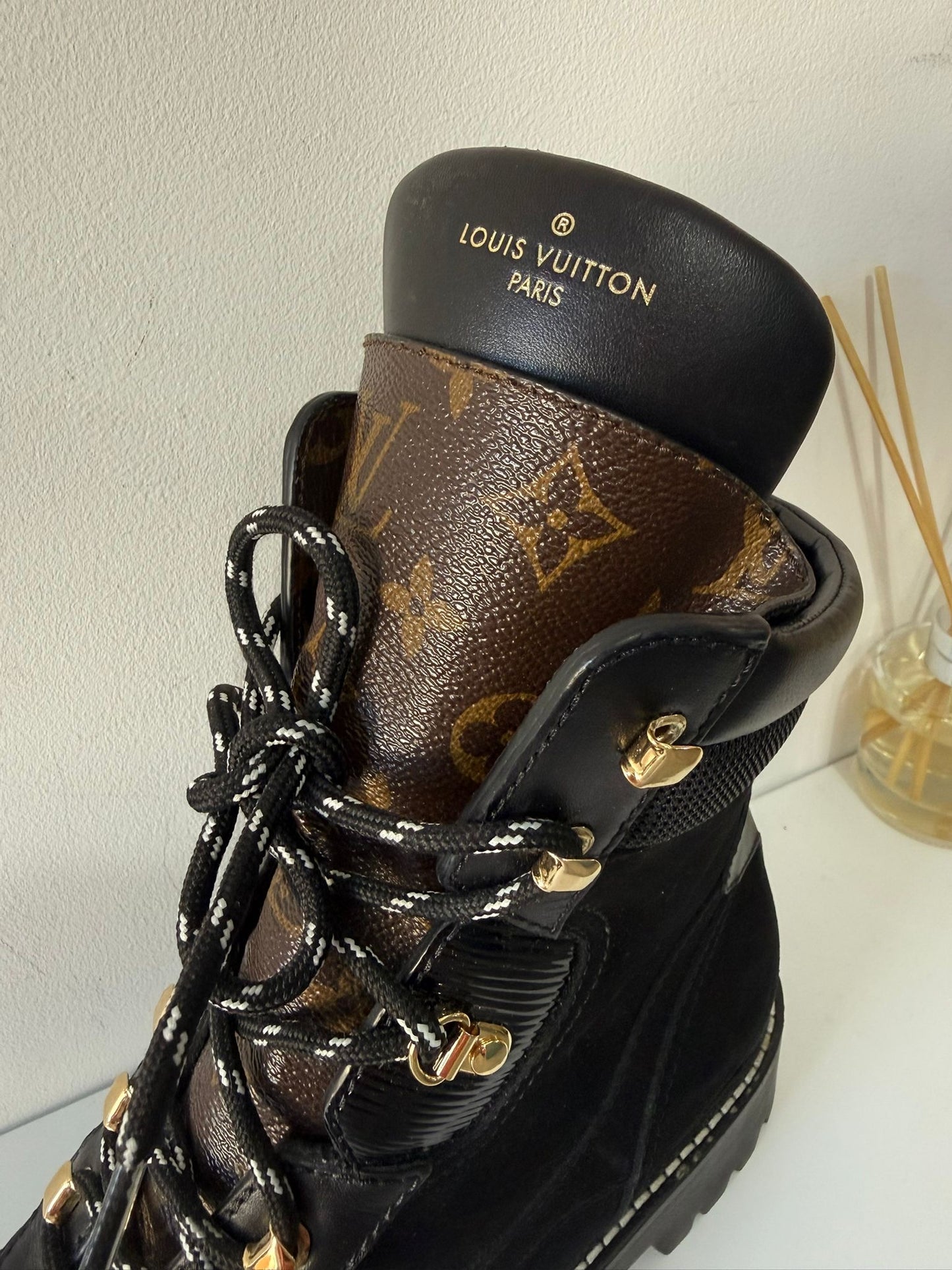 Preloved, Black Suede and leather construction with gold-toned eyelets. Louis Vuitton Territory Flat Ranger boots, Size 38.5 - UK 5.5