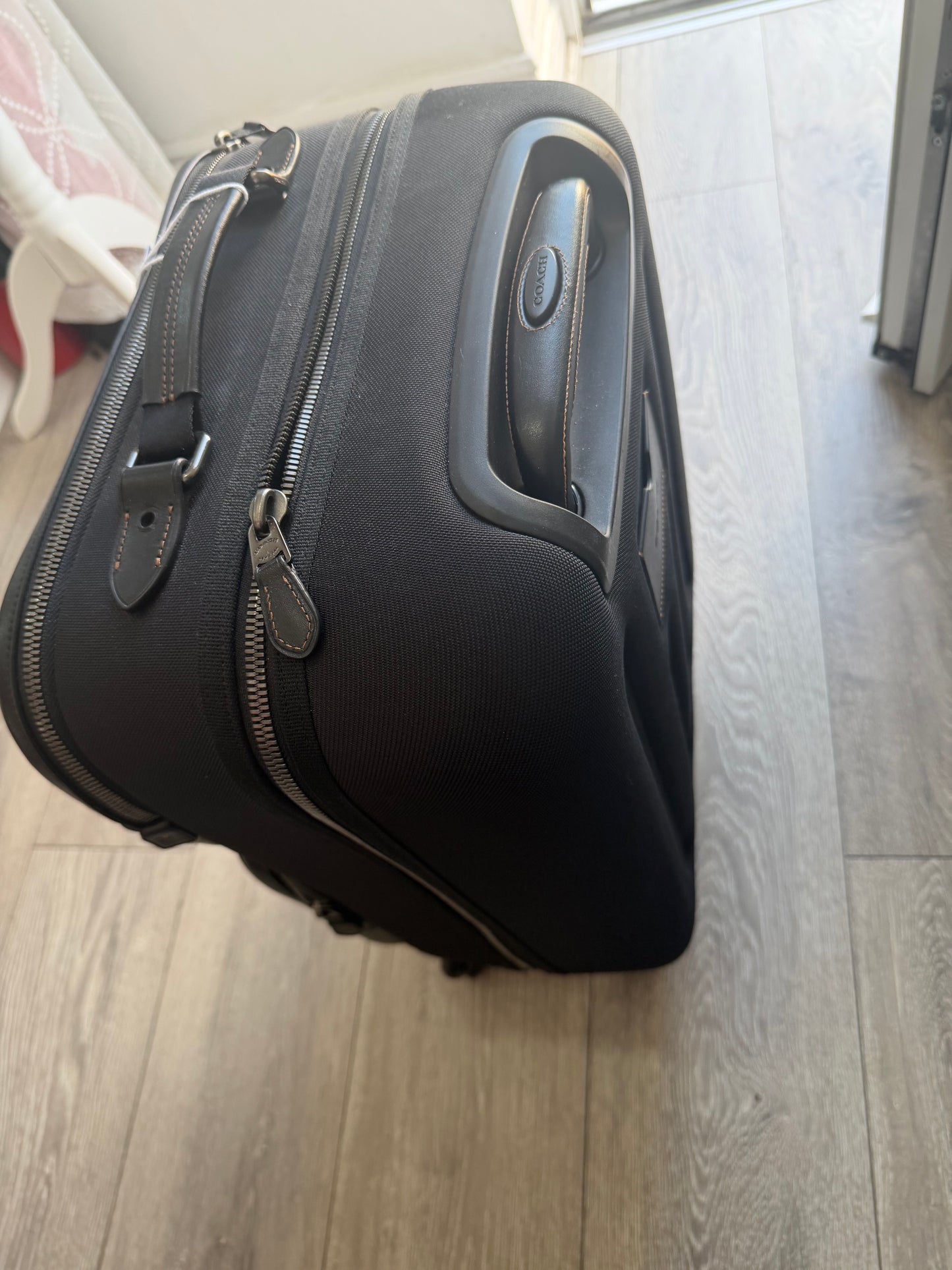 Preloved black and tan Coach Luggage, Medium