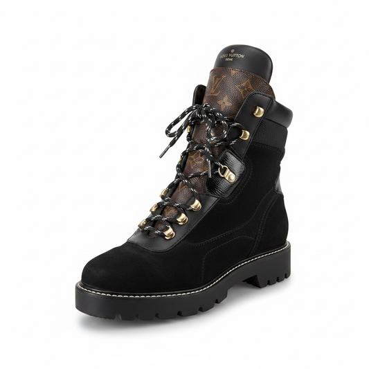 Preloved, Black Suede and leather construction with gold-toned eyelets. Louis Vuitton Territory Flat Ranger boots, Size 38.5 - UK 5.5