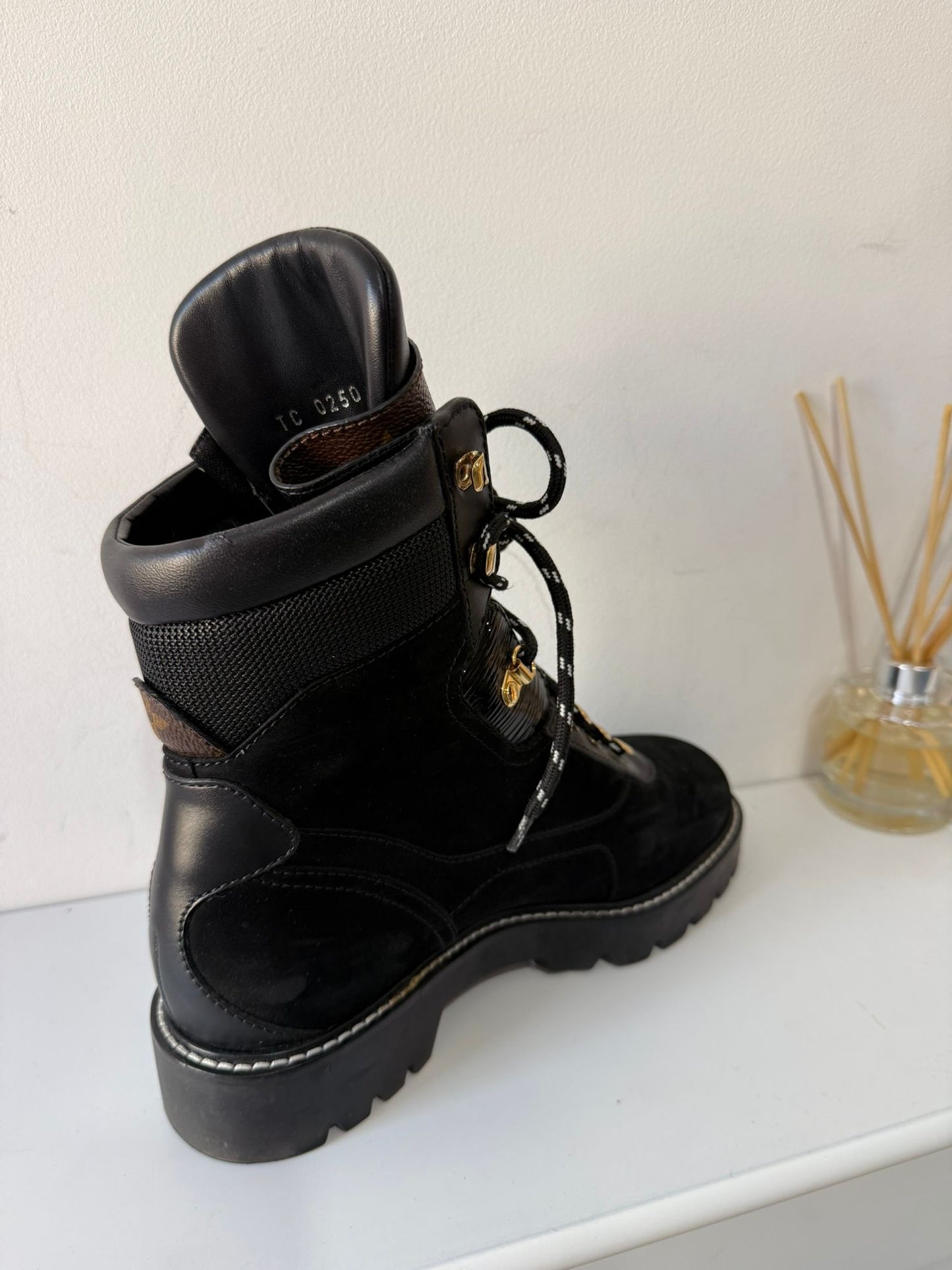 Preloved, Black Suede and leather construction with gold-toned eyelets. Louis Vuitton Territory Flat Ranger boots, Size 38.5 - UK 5.5