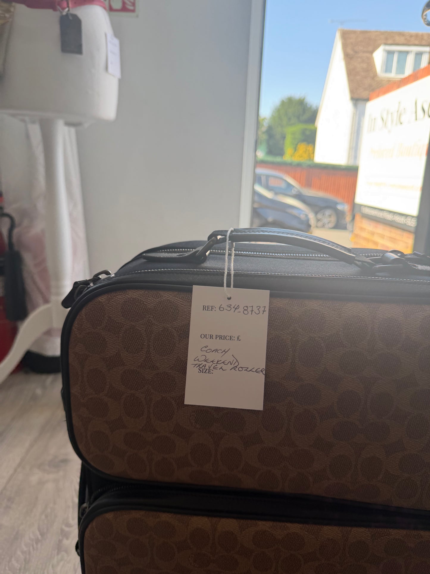 Preloved black and tan Coach Luggage, Medium